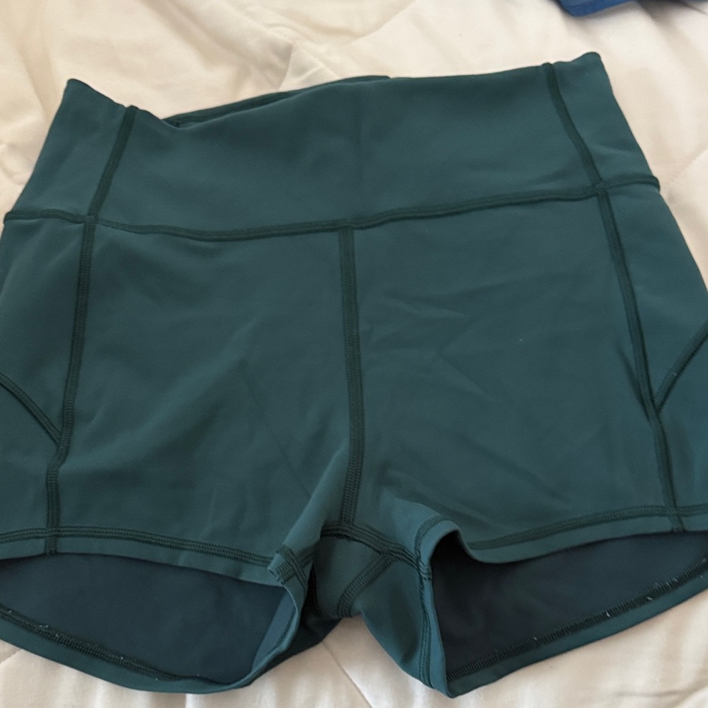 Teal Lululemon biker shorts size 6